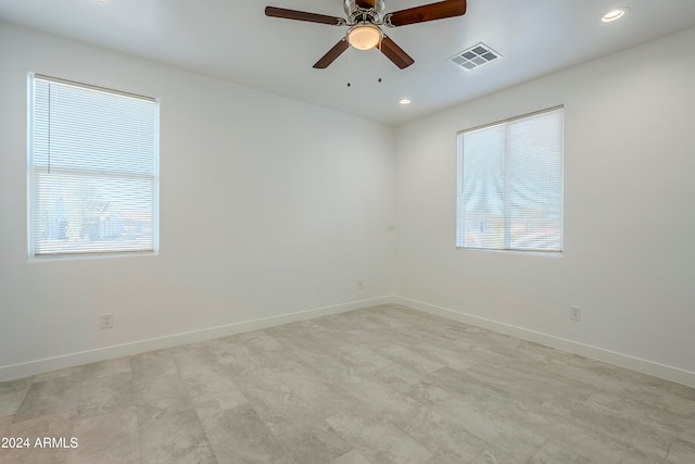 empty room featuring ceiling fan