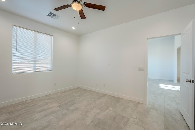 empty room with ceiling fan