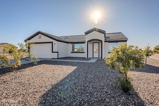 view of front of property with a garage