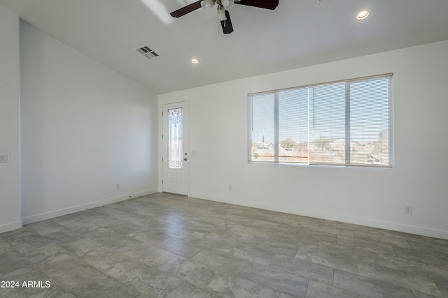 entrance foyer with vaulted ceiling, plenty of natural light, and ceiling fan