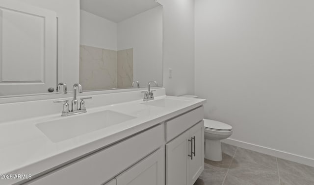 3913 S 233rd Ln, Buckeye, AZ 85326 - full bathroom with toilet, double vanity, baseboards, and tile patterned floors