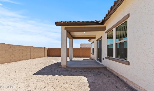 3913 S 233rd Ln, Buckeye, AZ 85326 - fenced backyard featuring a patio