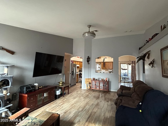 living room featuring wood finished floors and visible vents