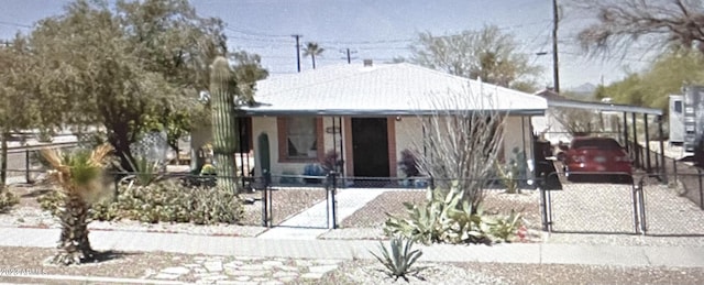 201 E 2nd Ave, Ajo, AZ 85321 - single story home featuring a gate and a fenced front yard