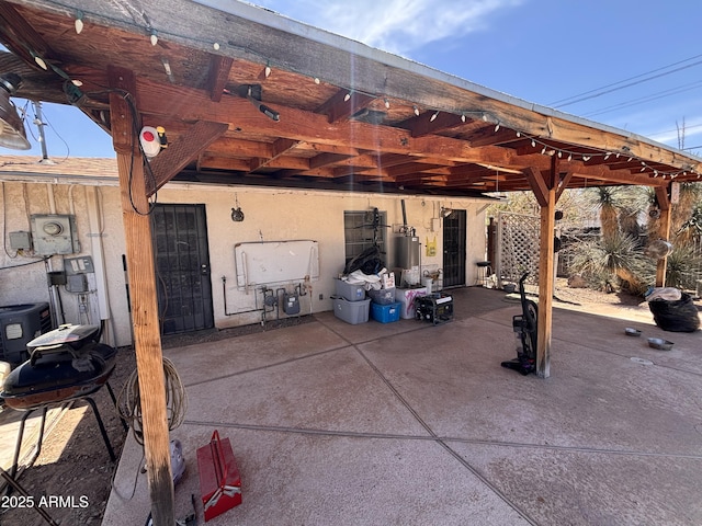201 E 2nd Ave, Ajo, AZ 85321 - view of patio featuring gas water heater