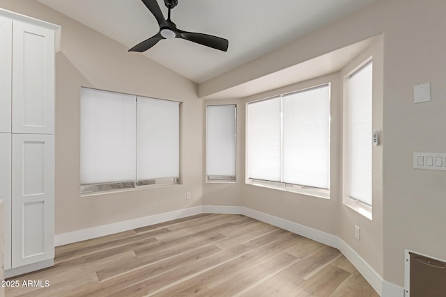 2189 E Ranch Ct, Gilbert, AZ 85296 - unfurnished room featuring a ceiling fan, light wood finished floors, baseboards, and lofted ceiling