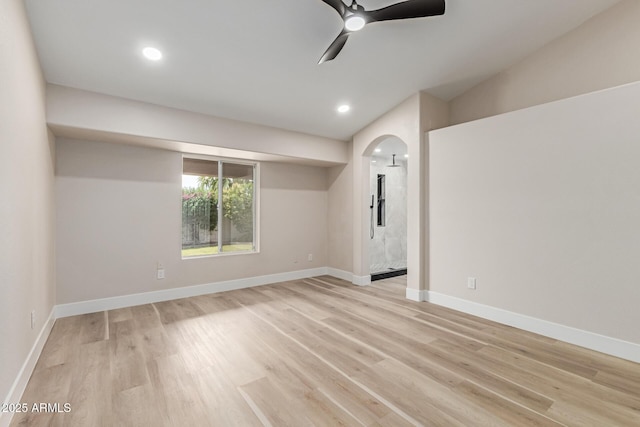 2189 E Ranch Ct, Gilbert, AZ 85296 - unfurnished room featuring ceiling fan, light wood-type flooring, arched walkways, and recessed lighting