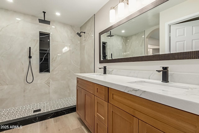 2189 E Ranch Ct, Gilbert, AZ 85296 - full bath featuring double vanity, a marble finish shower, wood finished floors, and recessed lighting