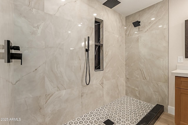 2189 E Ranch Ct, Gilbert, AZ 85296 - bathroom featuring vanity, a tile shower, and wood finished floors