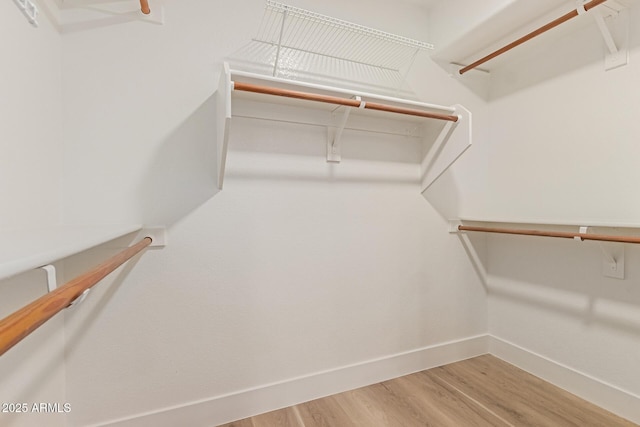 2189 E Ranch Ct, Gilbert, AZ 85296 - spacious closet featuring wood finished floors