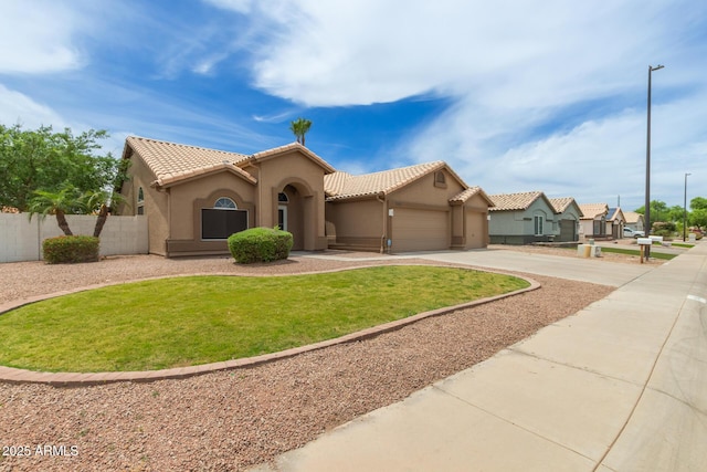 2189 E Ranch Ct, Gilbert, AZ 85296 - mediterranean / spanish-style home with a tiled roof, concrete driveway, stucco siding, and a garage
