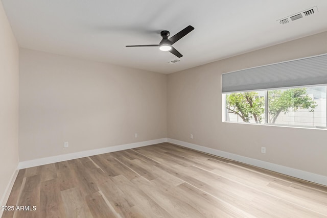 2189 E Ranch Ct, Gilbert, AZ 85296 - unfurnished room featuring light wood-style flooring, baseboards, and a ceiling fan
