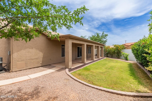 2189 E Ranch Ct, Gilbert, AZ 85296 - rear view of property featuring stucco siding and a patio area