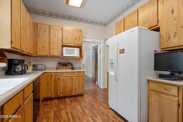 7252 N Central Ave, Phoenix, AZ 85020 - kitchen featuring white appliances, light wood-style floors, light countertops, and a sink