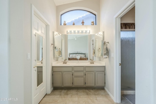 bathroom featuring vanity and a shower with shower door