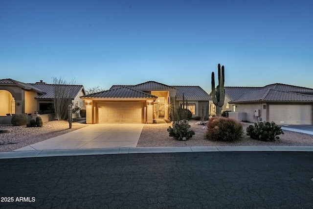 view of front of home with a garage