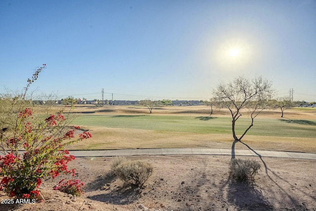 surrounding community featuring a yard