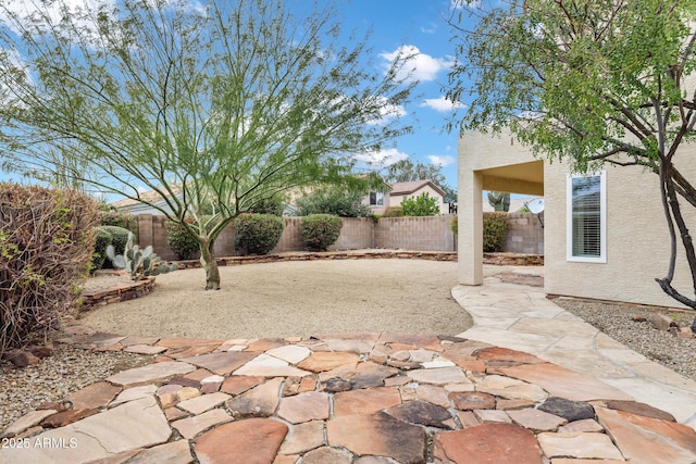 view of patio featuring a fenced backyard