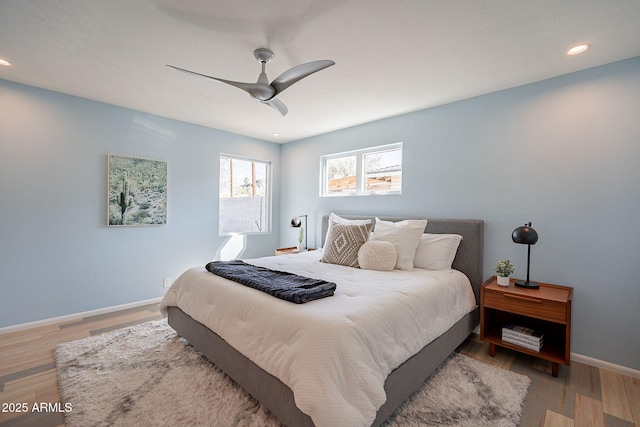 bedroom featuring recessed lighting, ceiling fan, baseboards, and wood finished floors