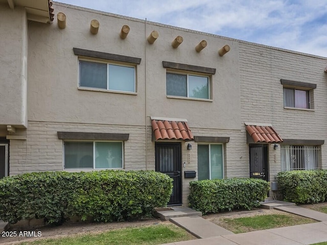 multi unit property featuring stucco siding