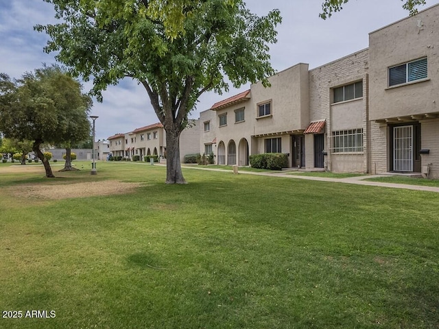 surrounding community with a lawn
