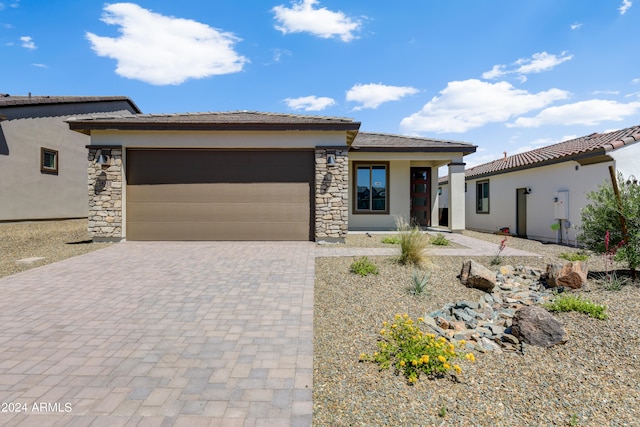 prairie-style house with a garage