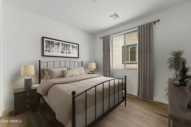 bedroom with light wood-type flooring