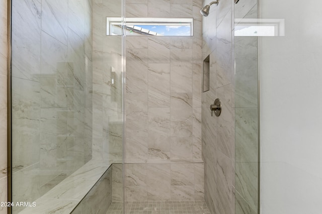 bathroom with an enclosed shower