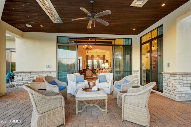 view of patio / terrace featuring ceiling fan and outdoor lounge area