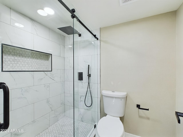 bathroom with toilet and walk in shower