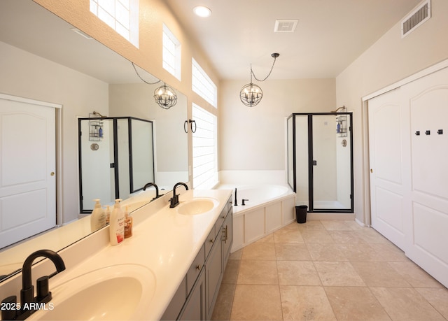 full bathroom with a bath, a sink, visible vents, and a stall shower