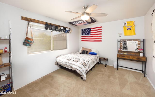 carpeted bedroom with a ceiling fan