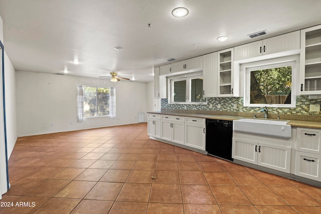 kitchen with ceiling fan, sink, white cabinetry, dishwasher, and decorative backsplash