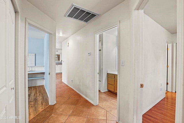 hall featuring light wood-type flooring