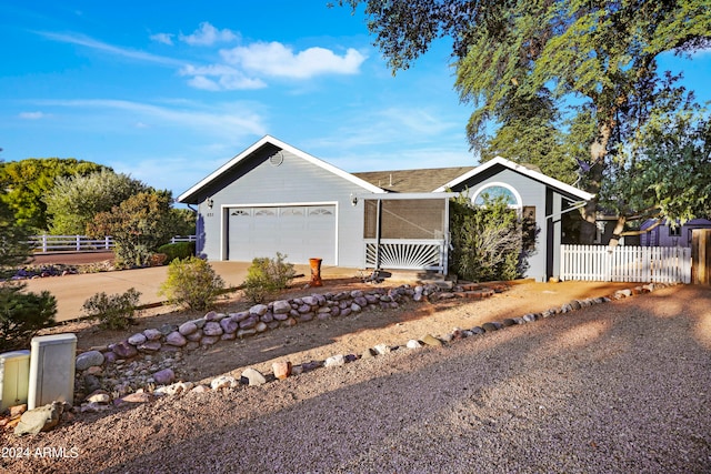 ranch-style home with a garage