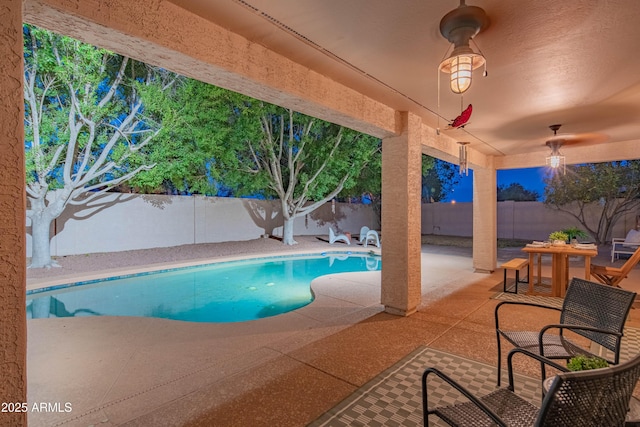 view of swimming pool with a patio area, a fenced backyard, and a fenced in pool