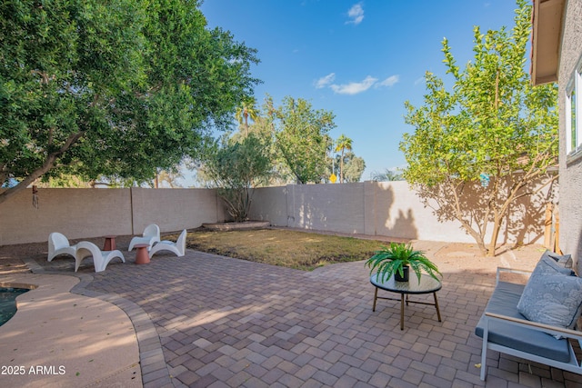 view of patio with a fenced backyard