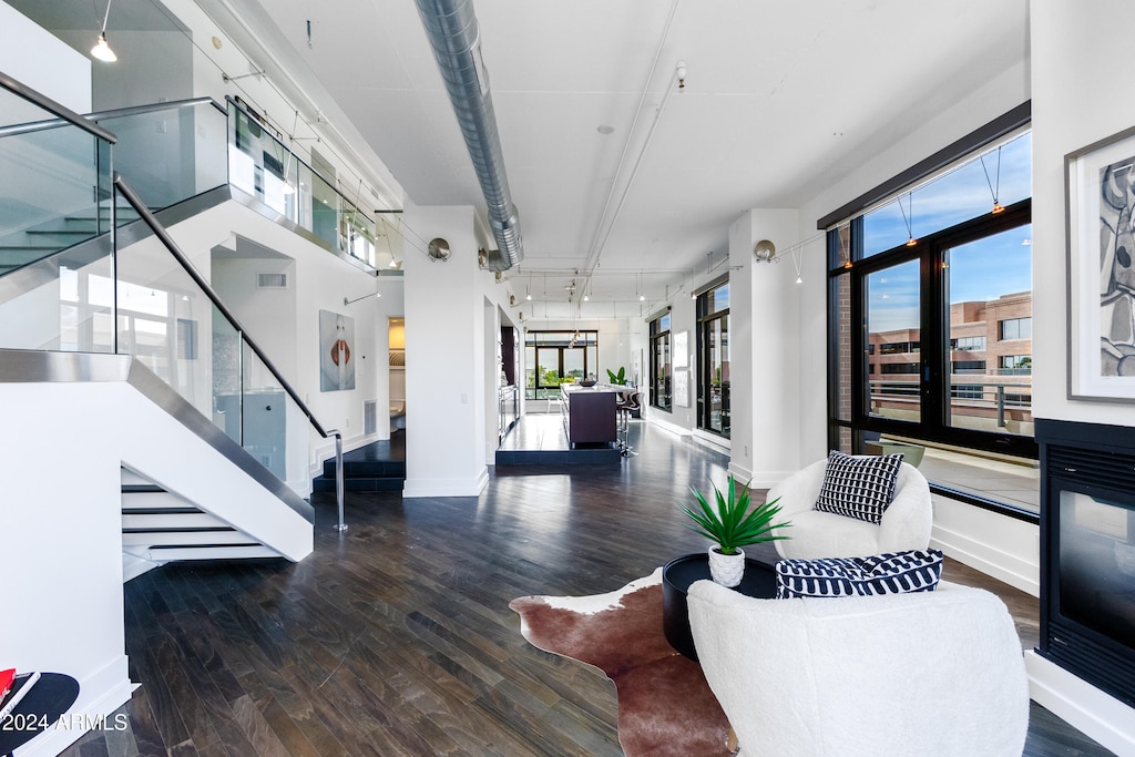 living room featuring dark hardwood / wood-style floors