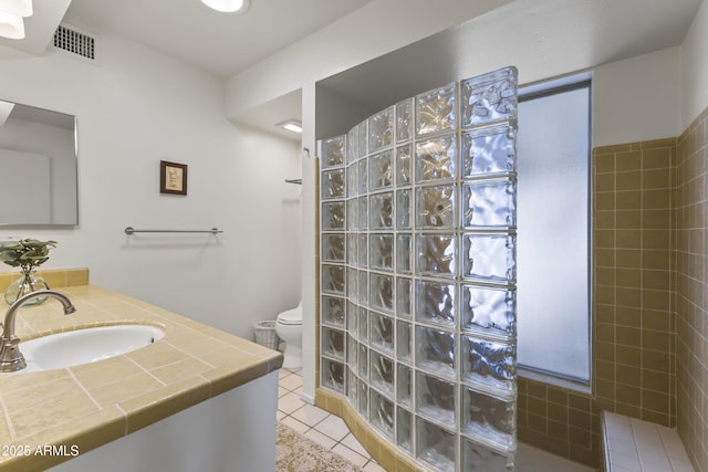 bathroom with toilet, walk in shower, visible vents, and tile patterned floors