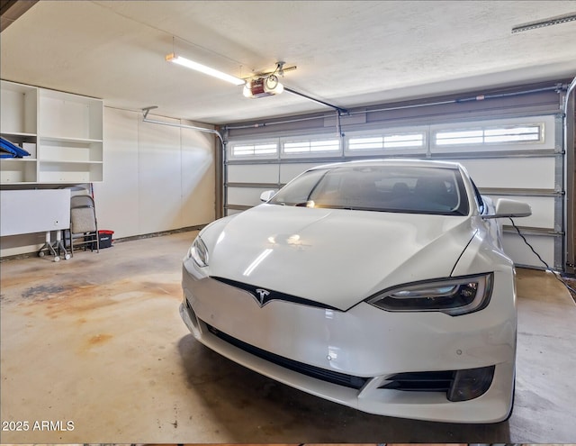 garage with a garage door opener