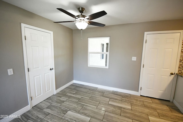 empty room with ceiling fan