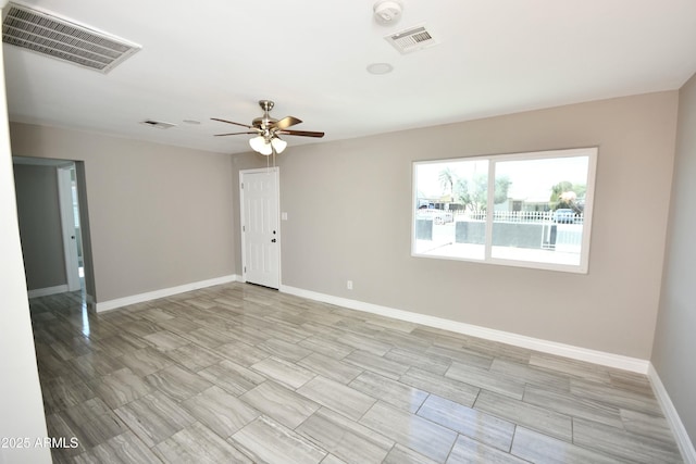 unfurnished room featuring ceiling fan