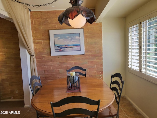 8220 E Garfield St Unit M214, Scottsdale, AZ 85257 - tiled dining room with a wealth of natural light and baseboards