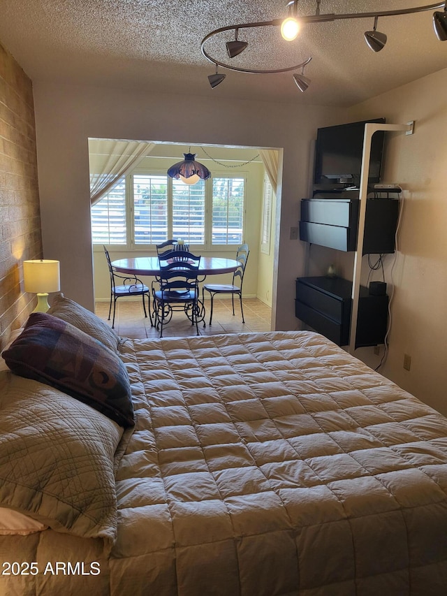 8220 E Garfield St Unit M214, Scottsdale, AZ 85257 - bedroom with a textured ceiling and light colored carpet