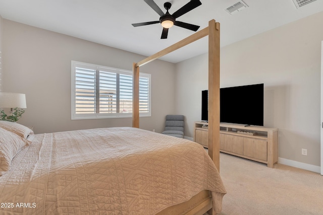 bedroom featuring baseboards, ceiling fan, visible vents, and light colored carpet