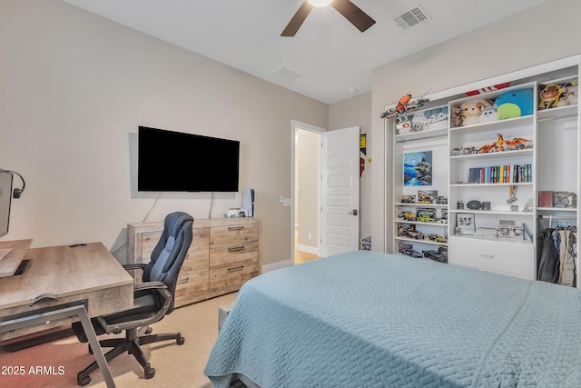 bedroom featuring a ceiling fan, visible vents, carpet floors, and baseboards