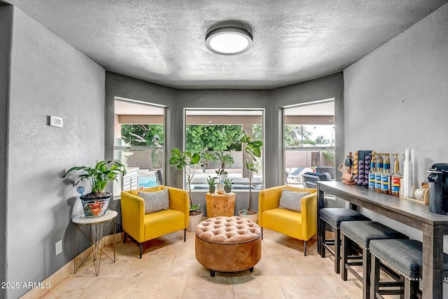2405 E Lynwood Cir, Mesa, AZ 85213 - sitting room with a textured ceiling and a textured wall