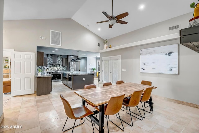 2405 E Lynwood Cir, Mesa, AZ 85213 - dining area featuring a ceiling fan, high vaulted ceiling, baseboards, recessed lighting, and light tile patterned floors
