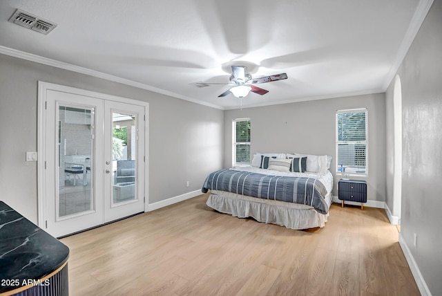 2405 E Lynwood Cir, Mesa, AZ 85213 - bedroom featuring french doors, access to outside, wood finished floors, multiple windows, and crown molding