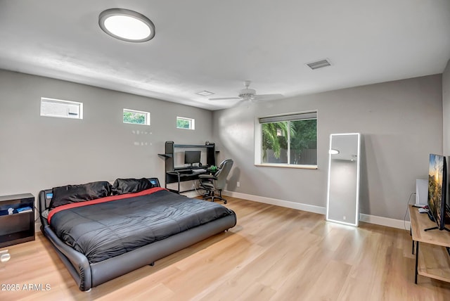 2405 E Lynwood Cir, Mesa, AZ 85213 - bedroom with wood finished floors, baseboards, and ceiling fan